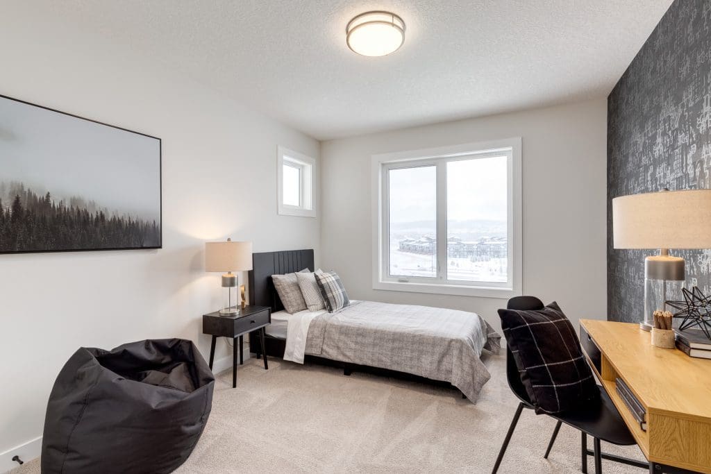 Crimson Ridge Showhome Kids room with a view of Cochranes Glenbow Ranch