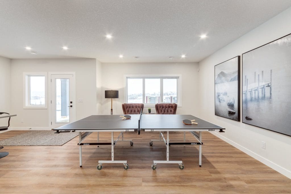 Crimson Ridge Showhome Basement Ping Pong table hang out hub