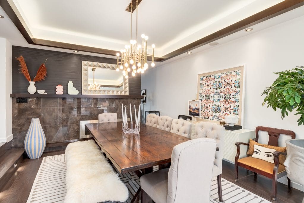 Dining room table with accent wall behind