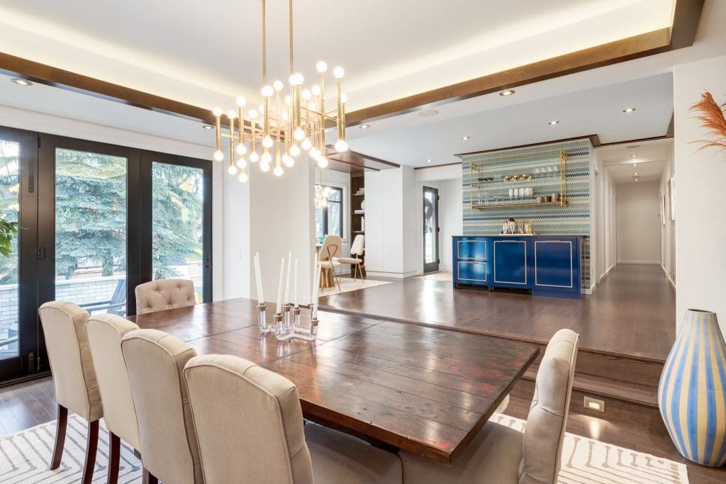 Detailed light fixture above dining room table