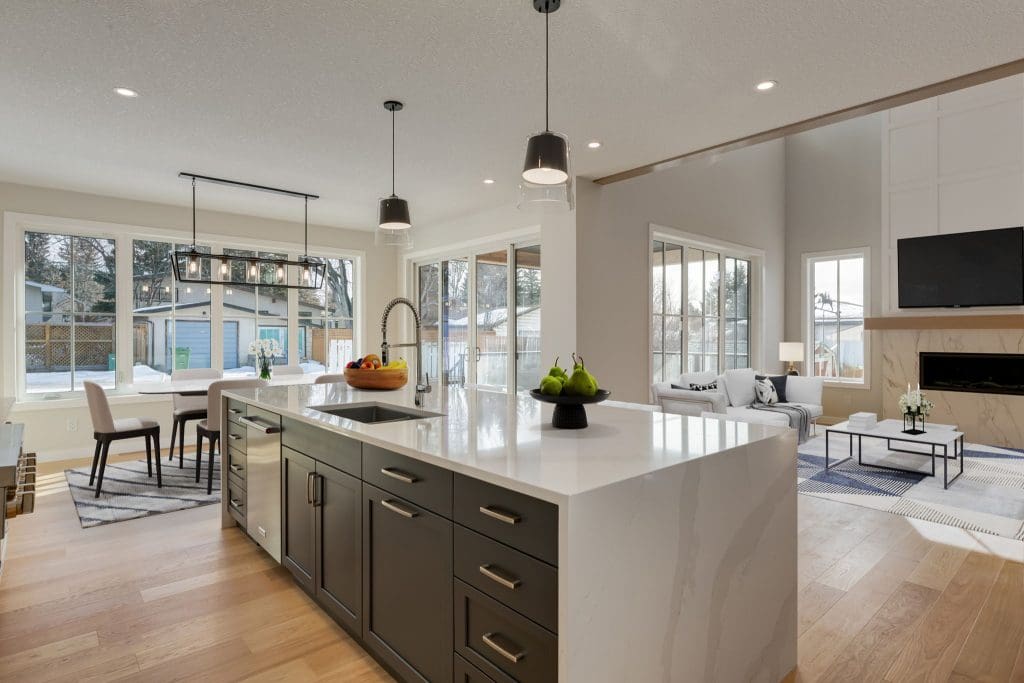 Charleswood Custom Home Build kitchen looking into dining room and living room